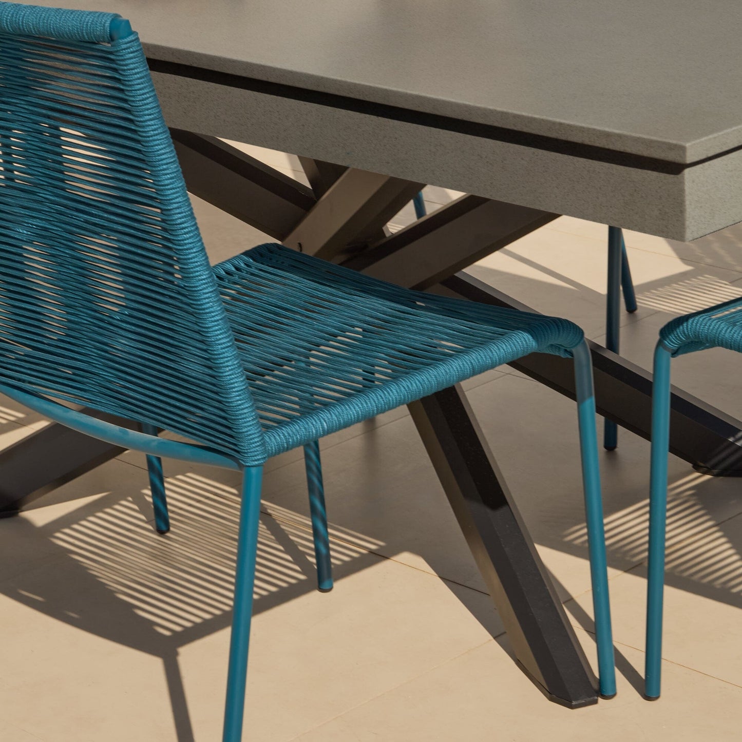Amelia 6 Seater Dove Grey Concrete Garden Dining Set with Ryder Teal Chairs - Laura James