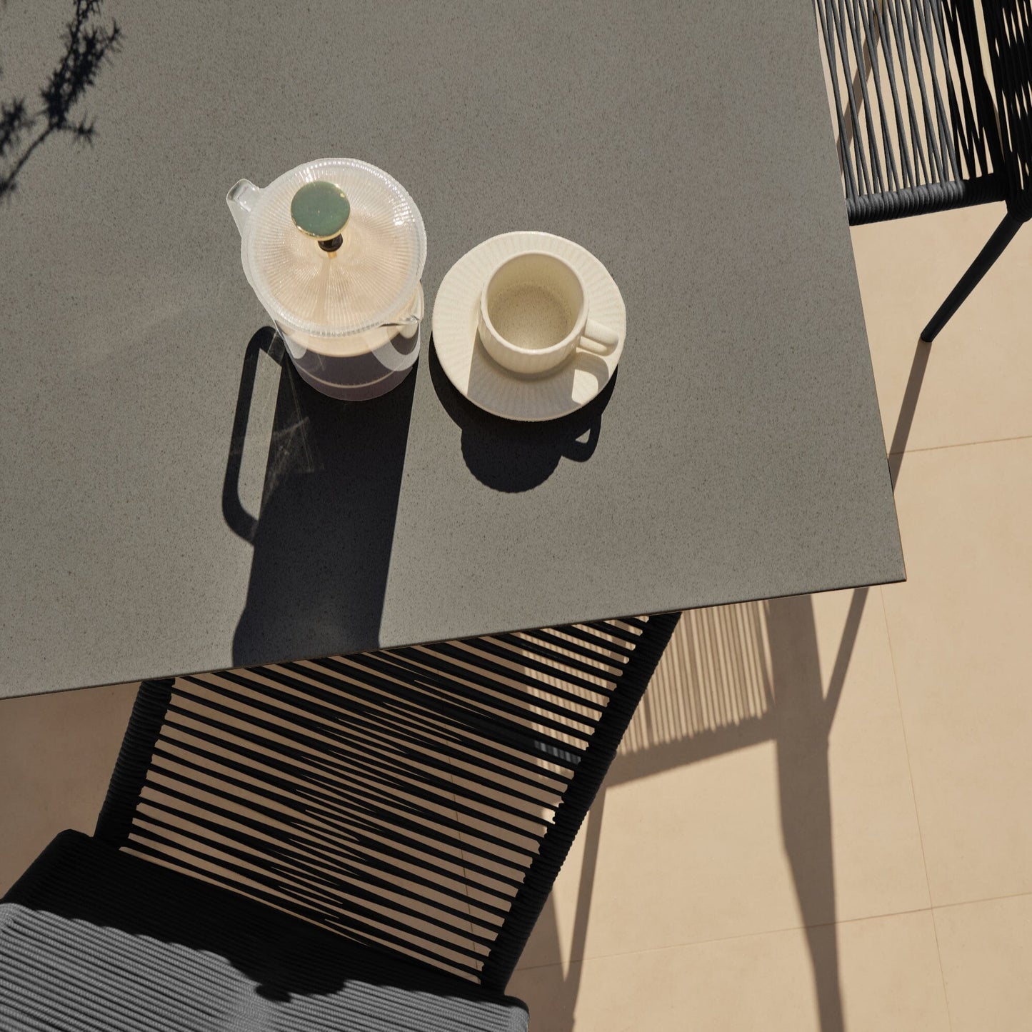 Amelia 6 Seater Dove Grey Concrete Garden Dining Set with Ryder Black Chairs - Laura James