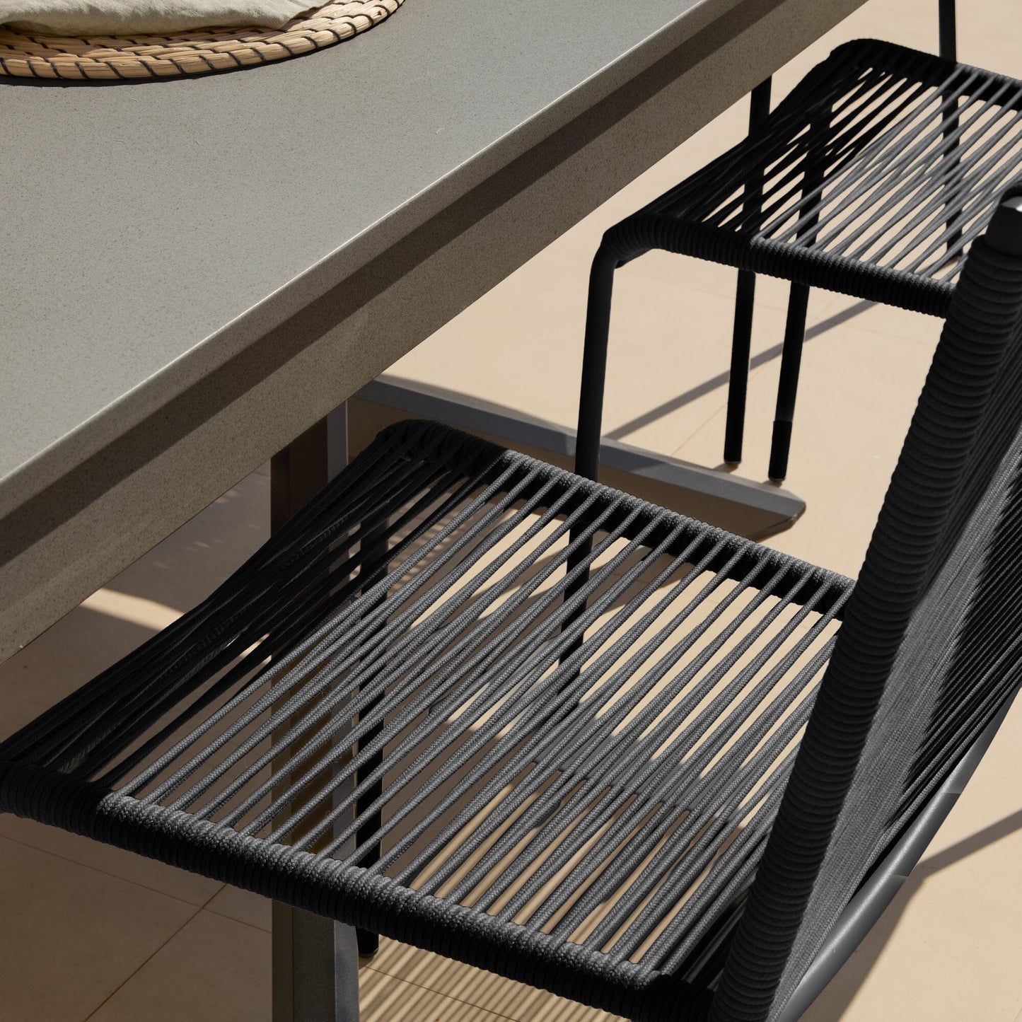 Amelia 6 Seater Dove Grey Concrete Garden Dining Set with Ryder Black Chairs - Laura James
