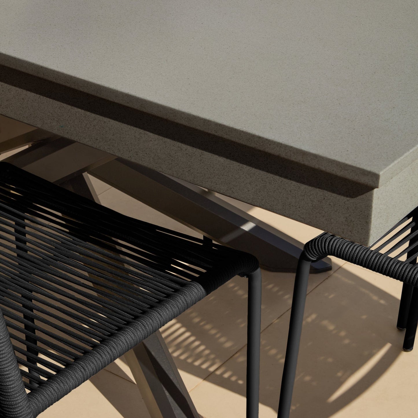 Amelia 6 Seater Dove Grey Concrete Garden Dining Set with Ryder Black Chairs - Laura James