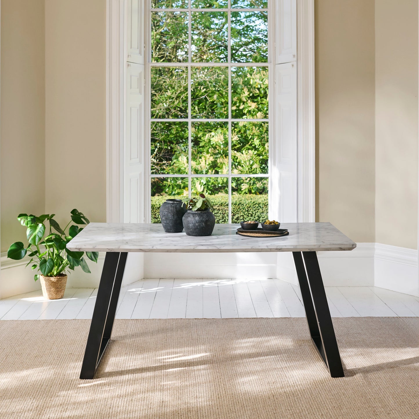 Atlas White Marble Dining Table - Black Metal Legs - Laura James