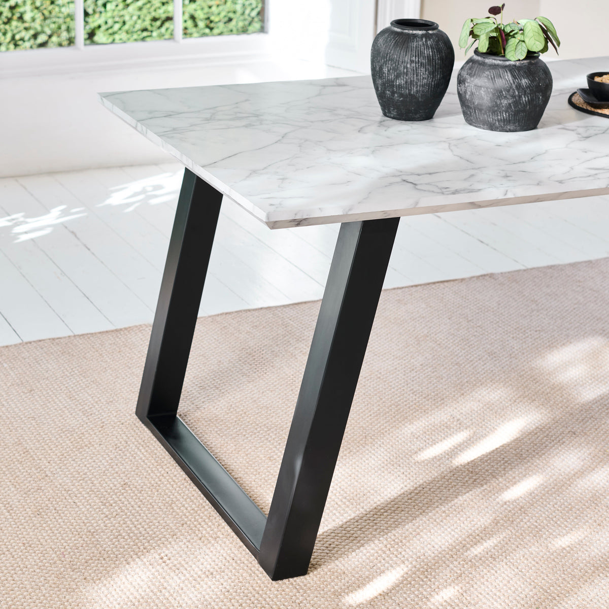 Atlas White Marble Dining Table - Black Metal Legs - Laura James