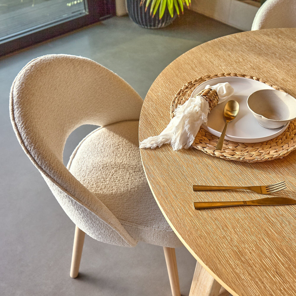 Carter Whitewash Round Dining Table with 4 Freya Boucle Dining Chairs with Whitewash Legs - Laura James