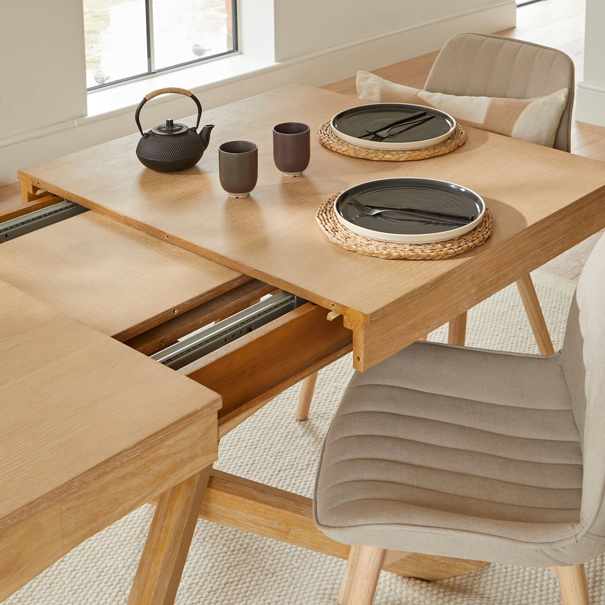 amelia-whitewash-extending-dining-set-bella-boucle-dining-chairs