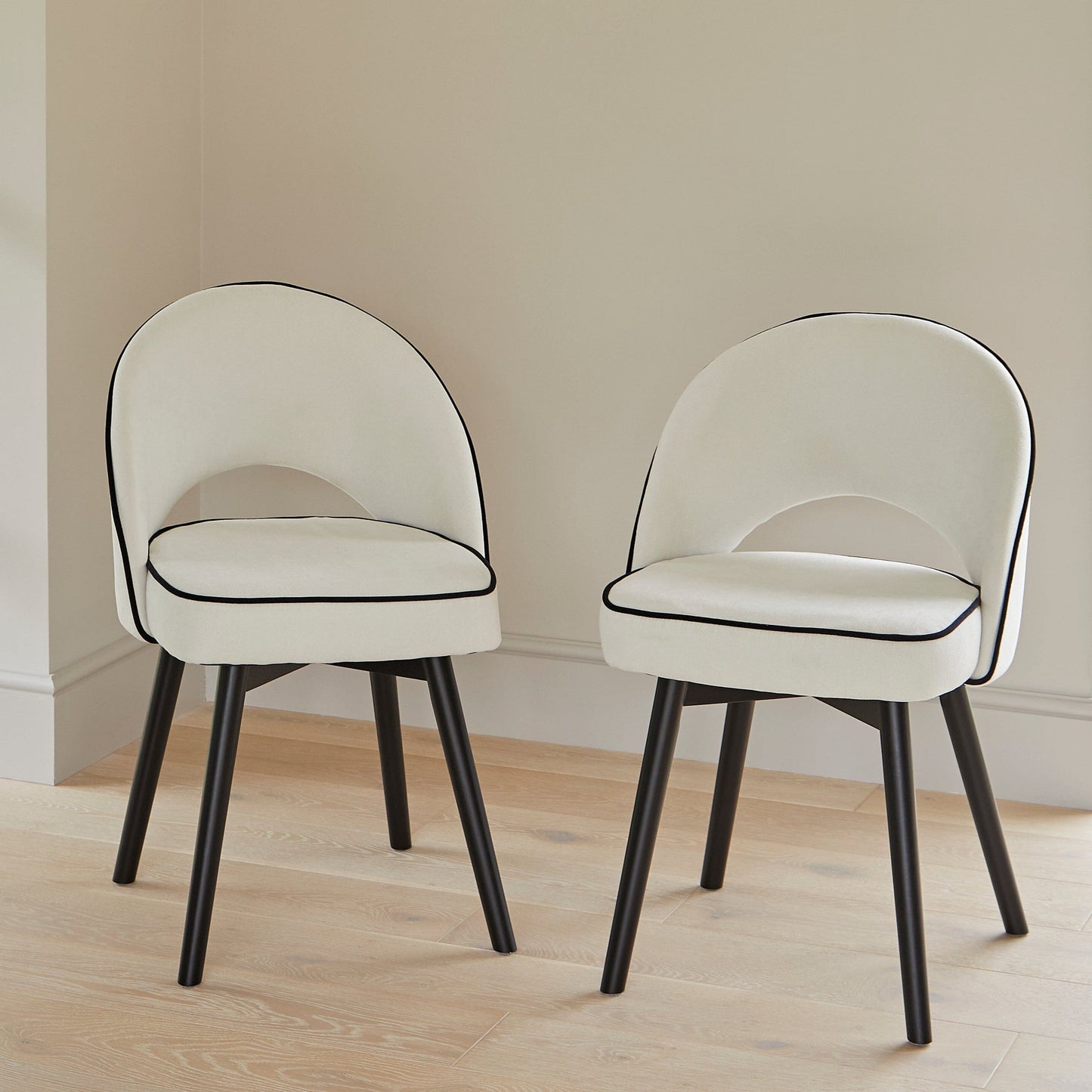 Marilyn Ivory with Black Piping Dining Chairs with Black Legs - Laura James