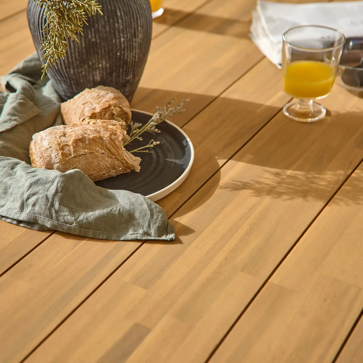 Ezra Whitewash Round Outdoor Dining Table Set with Black Hali Rope Chairs - Laura James