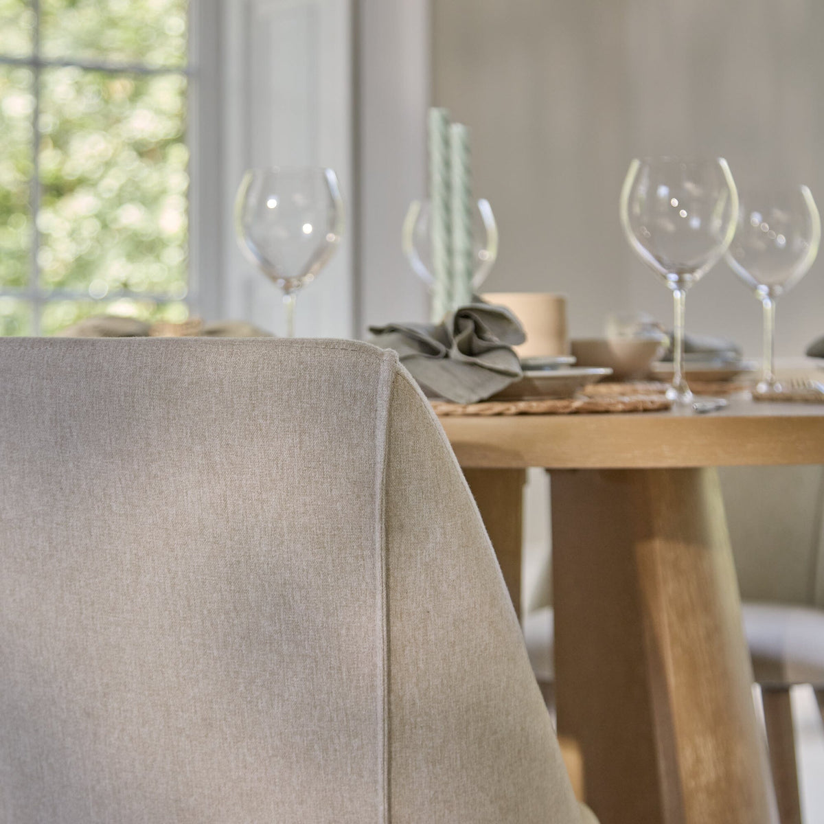 Farren Whitewash Oak Round Dining Table Set - 4 Seater - Freya Sand Dining Chairs - Whitewash Oak Legs