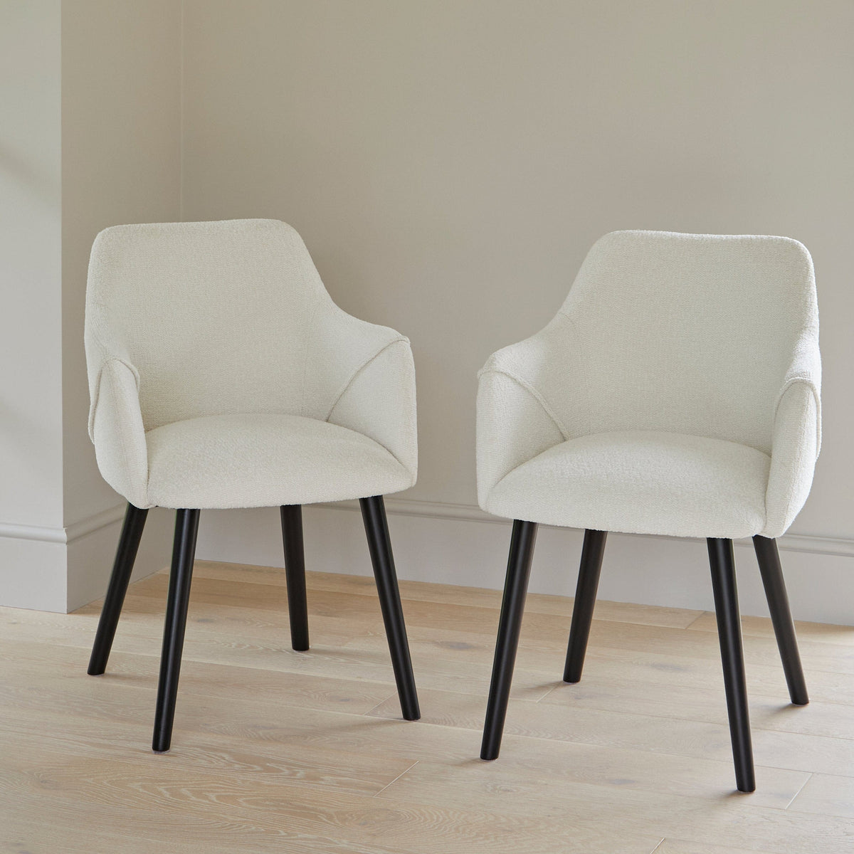 Freya Boucle Armchairs with Black Legs - Laura James