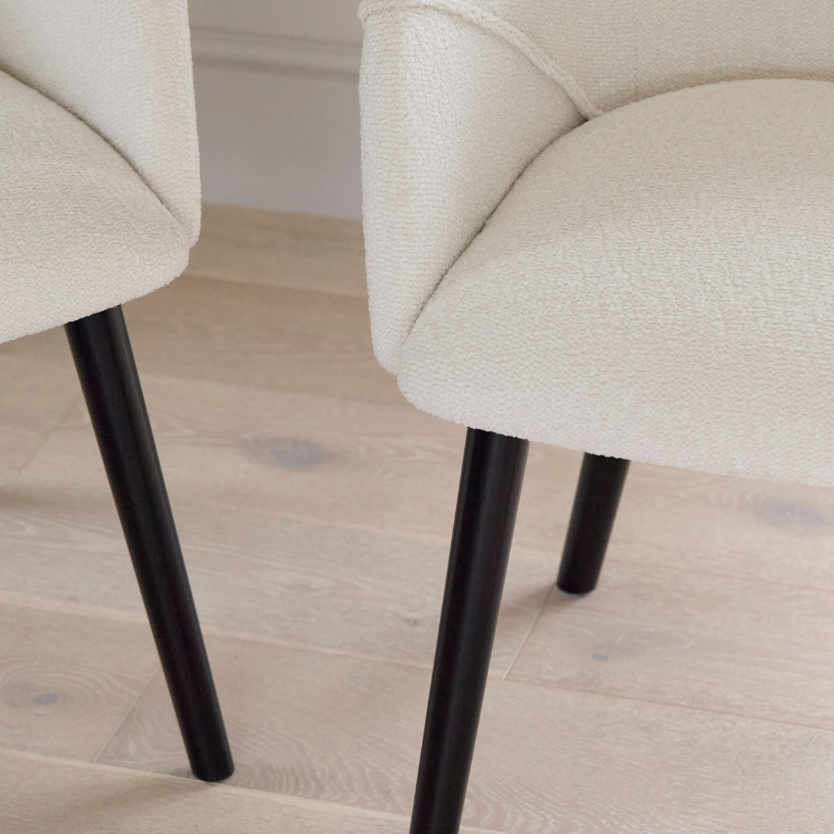 Freya Boucle Armchairs with Black Legs - Laura James