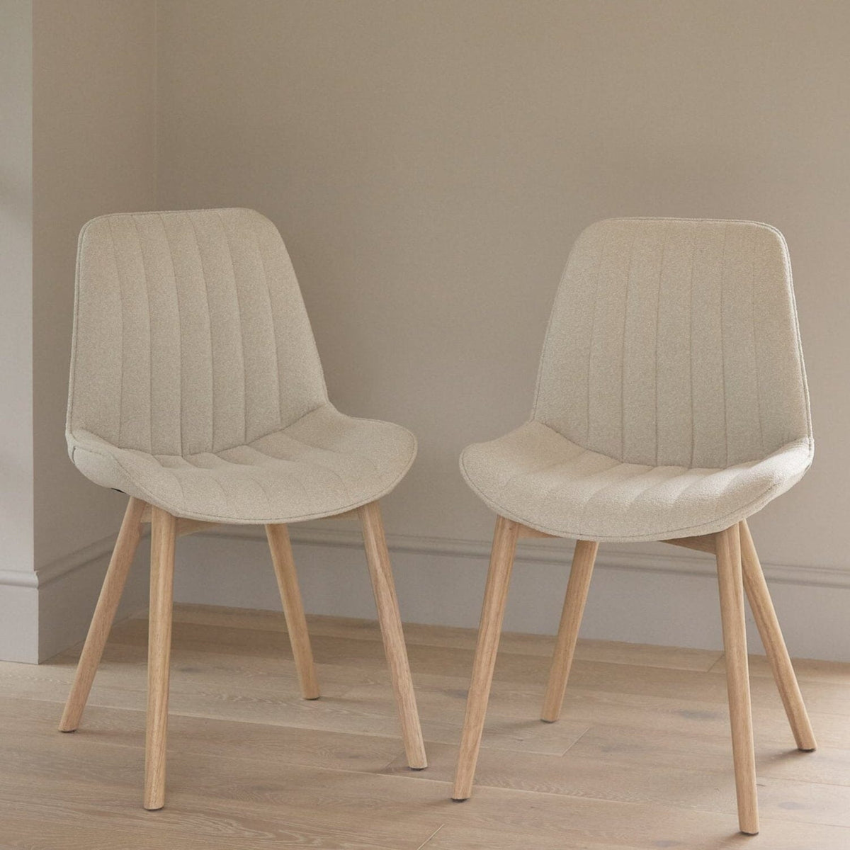 amelia-whitewash-extending-dining-set-bella-boucle-dining-chairs