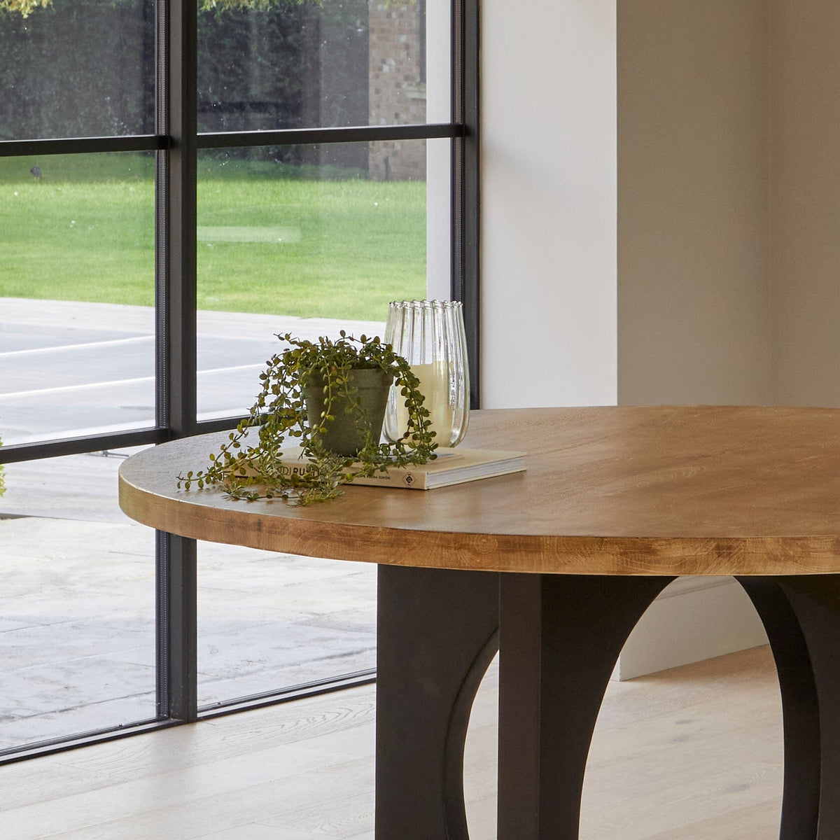 Jade Mango Wood Round Dining Table
- Laura James