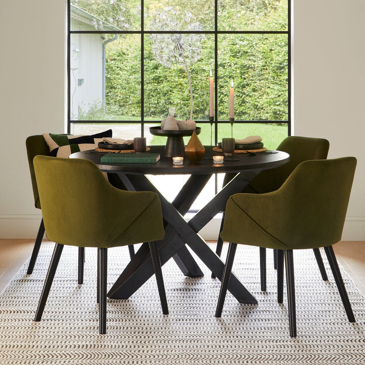 Levi Black Round Dining Table Set - 4 Seater - Freya Green Armchairs with Black Legs - Laura James