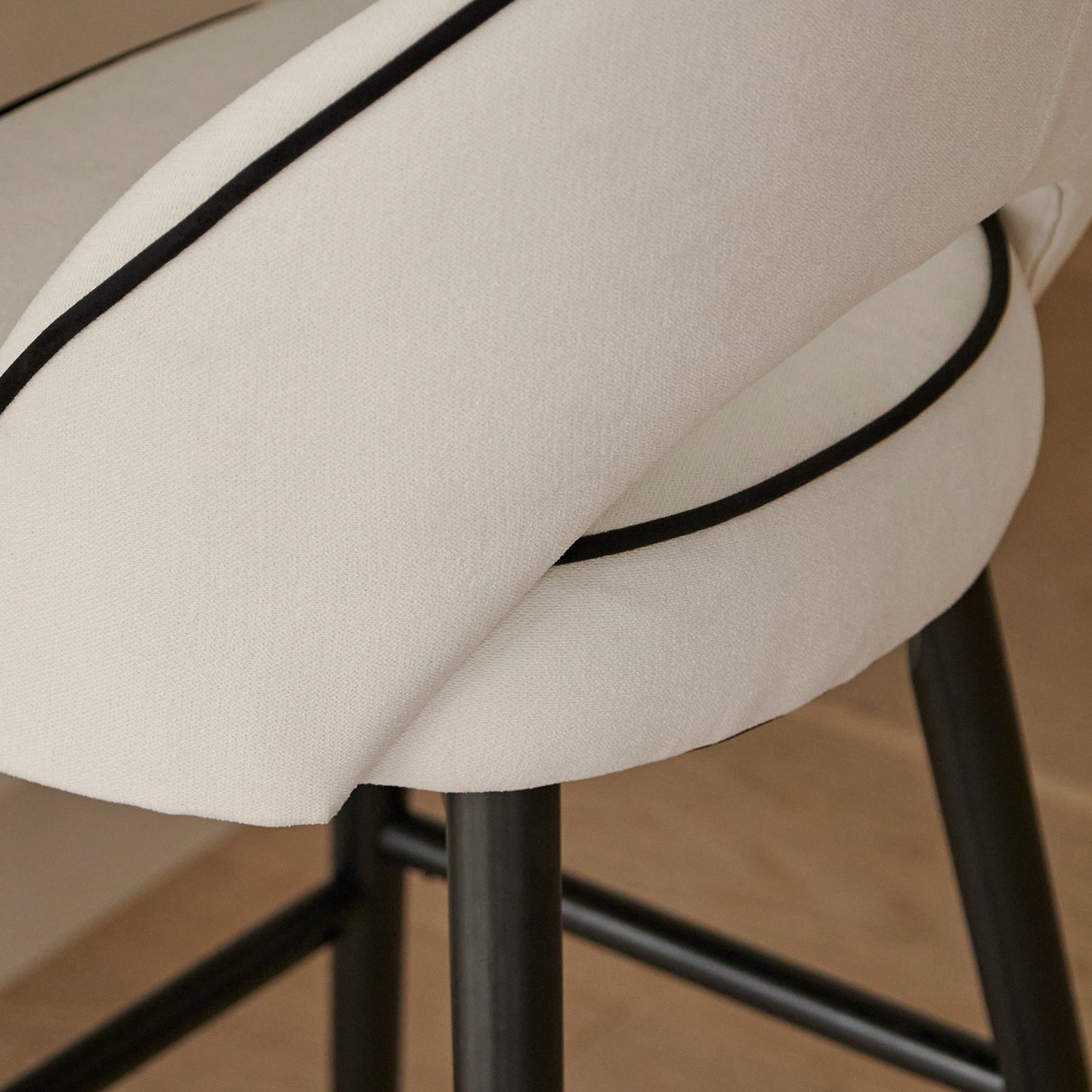 Levi Black Round Dining Table Set - 4 Seater - Marilyn Ivory and Black Piping Dining Chairs with Black Legs - Laura James