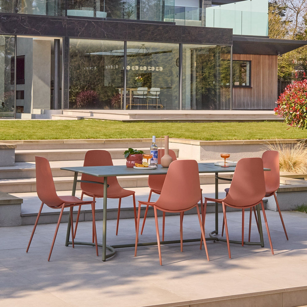 Wilder 6 Seater Metal Garden Dining Set with Wren Burnt Orange Chairs - Laura James