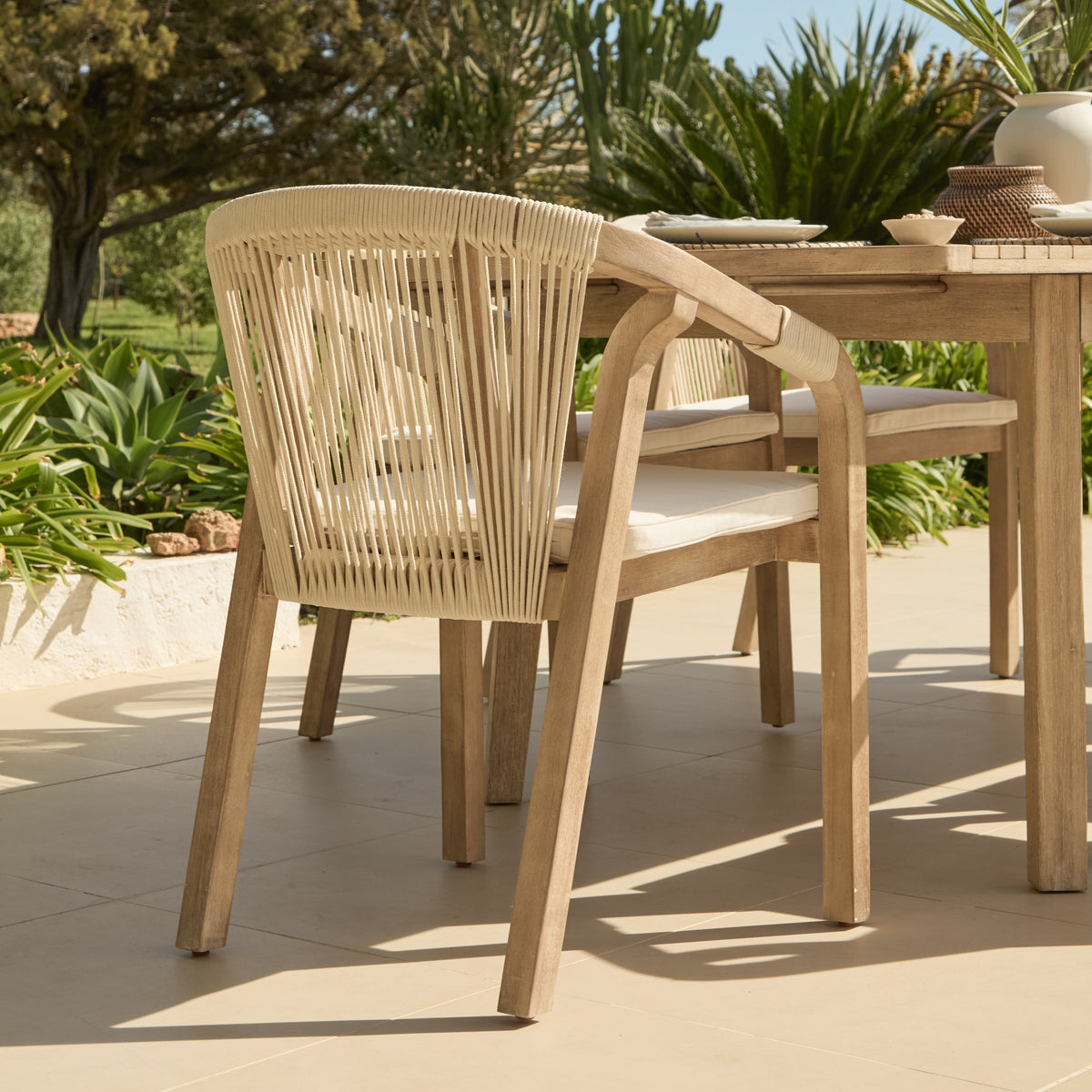 Saffron 6 Seater Extending Wooden Garden Dining Set with Shiro Beige Rope Chairs - Laura James