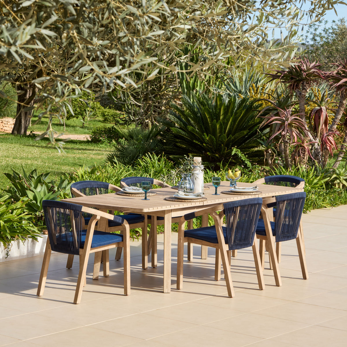 Saffron 6 Seater Extending Wooden Garden Dining Set with Shiro Navy Rope Chairs - Laura James