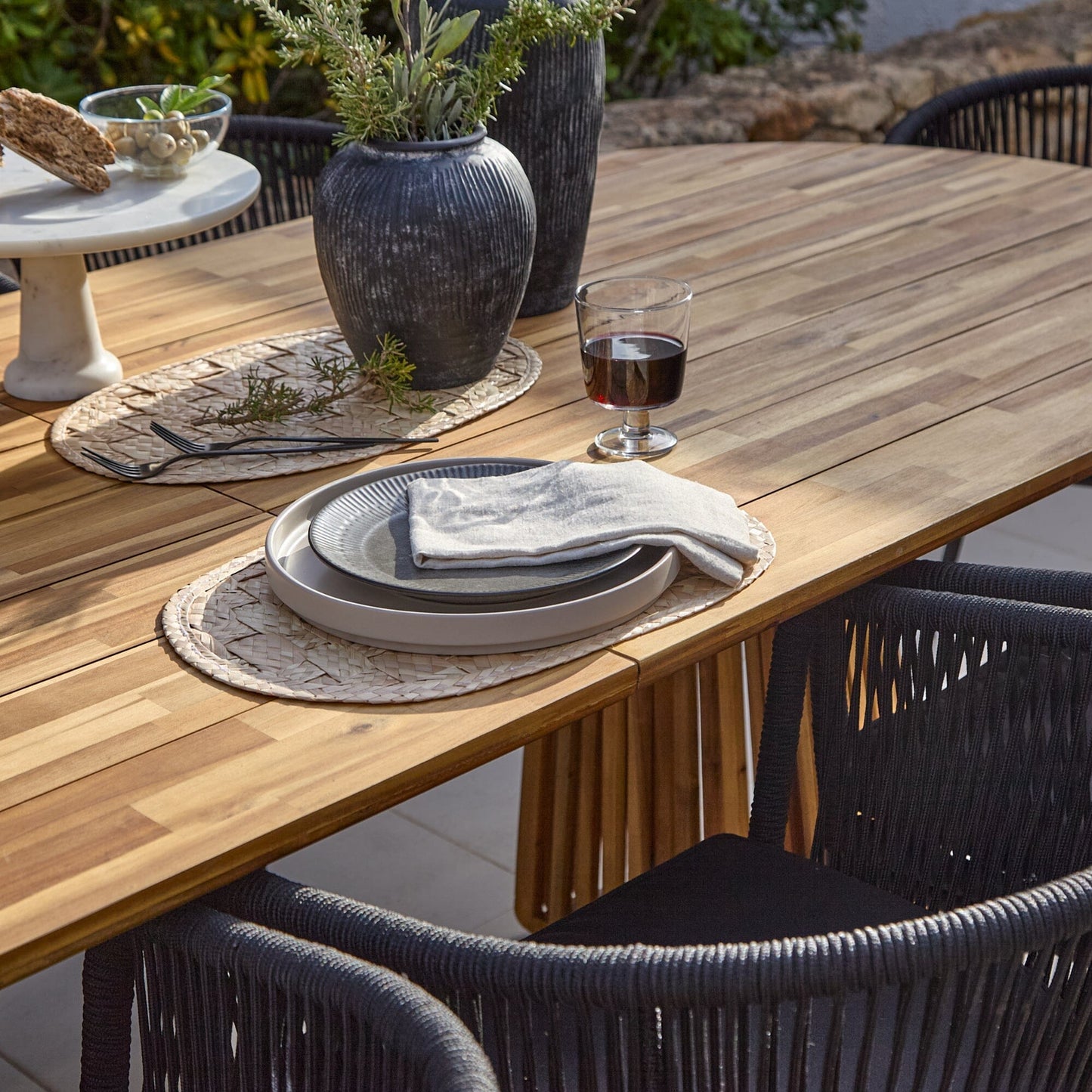 Willow Whitewash Outdoor Oval Dining Table with Black Rope Chair - Laura James