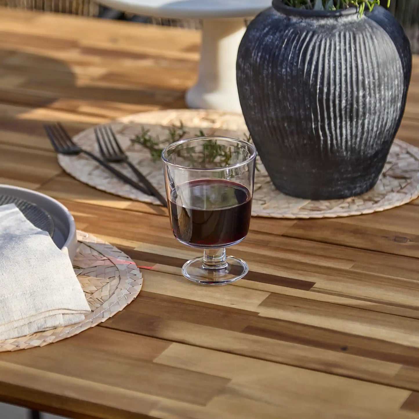 Willow Whitewash Outdoor Oval Dining Table with Black Rope Chair - Laura James