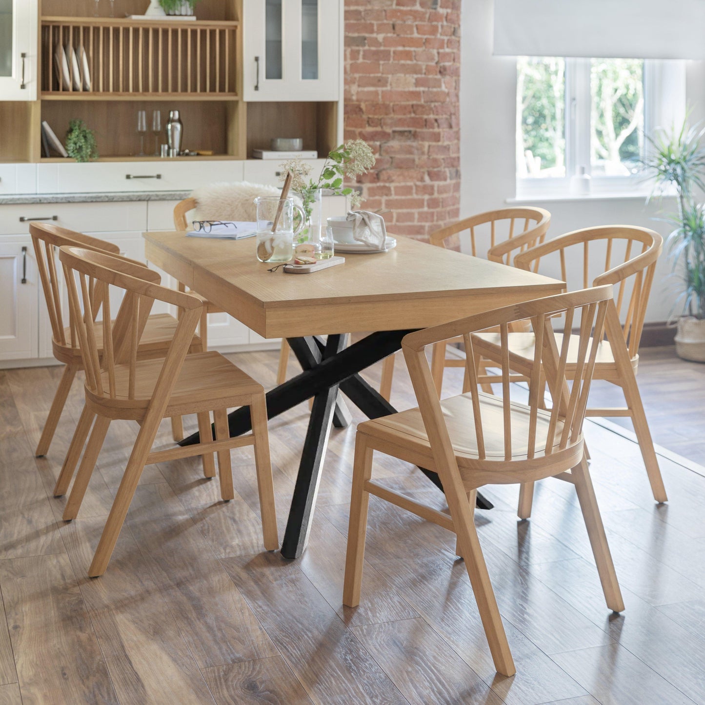 Amelia Pale Oak Extendable Dining Table Set with Black Legs - 6 Seater - Pale Oak Spindle Back Chairs - Laura James