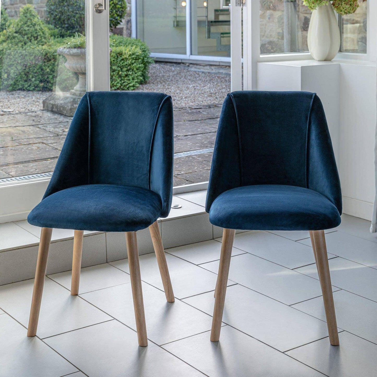 Amelia Whitewash Extendable Dining Table Set - 6 Seater - Freya Blue Dining Chairs With Pale Oak Legs - Laura James