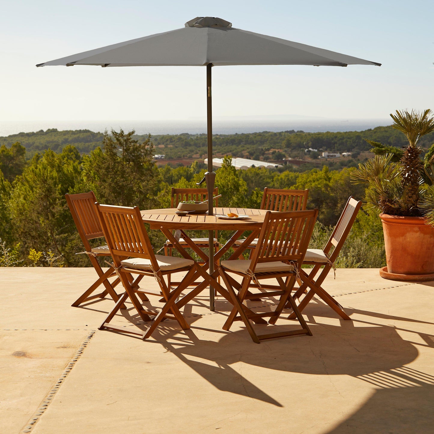 Ashby 6 Seater Round Wooden Dining Set and Grey Parasol - Laura James