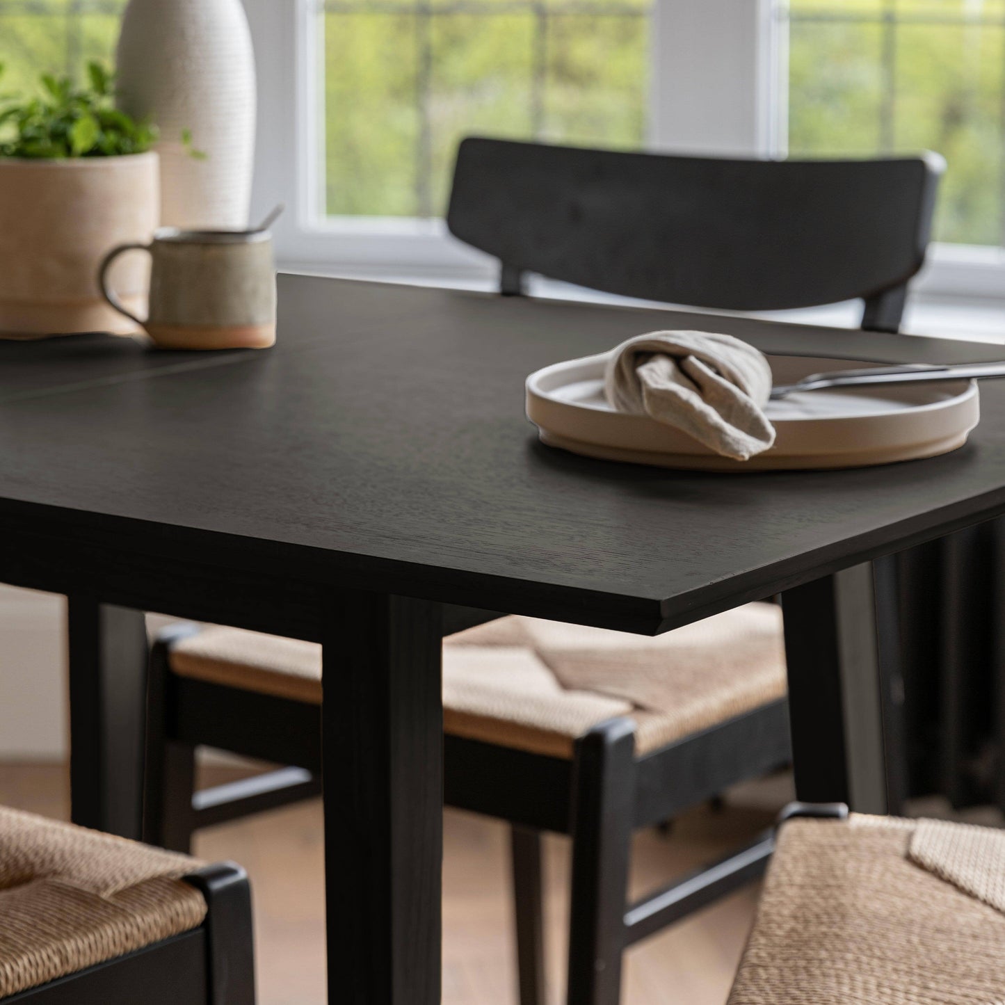 Charlie Black Extendable Dining Table Set - 4 Seater - Faye Woven Black Dining Chairs - Laura James