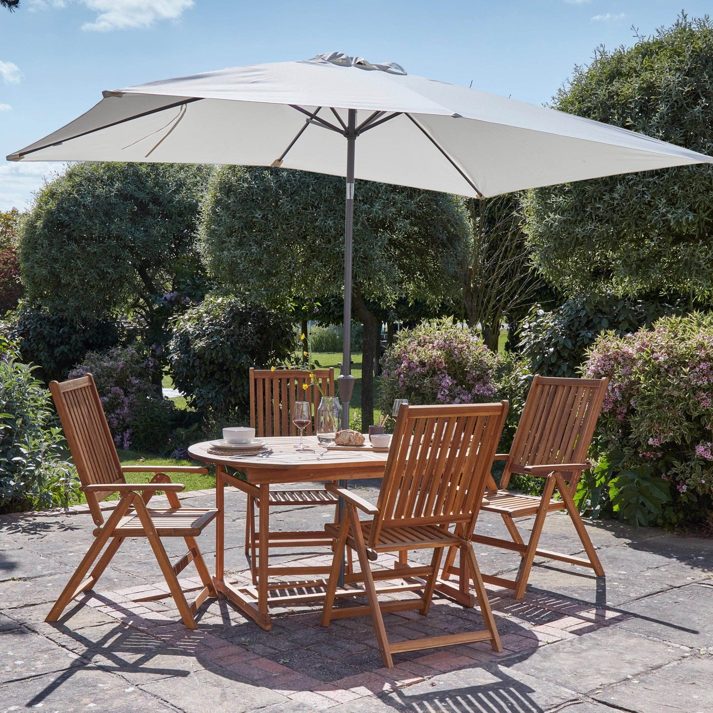 Oakley 4 Seater Wooden Extendable Garden Dining Set with Cream Parasol - Laura James
