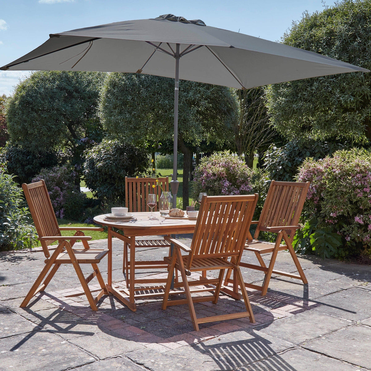 Oakley 4 Seater Wooden Extendable Garden Dining Set with Grey Parasol - Laura James