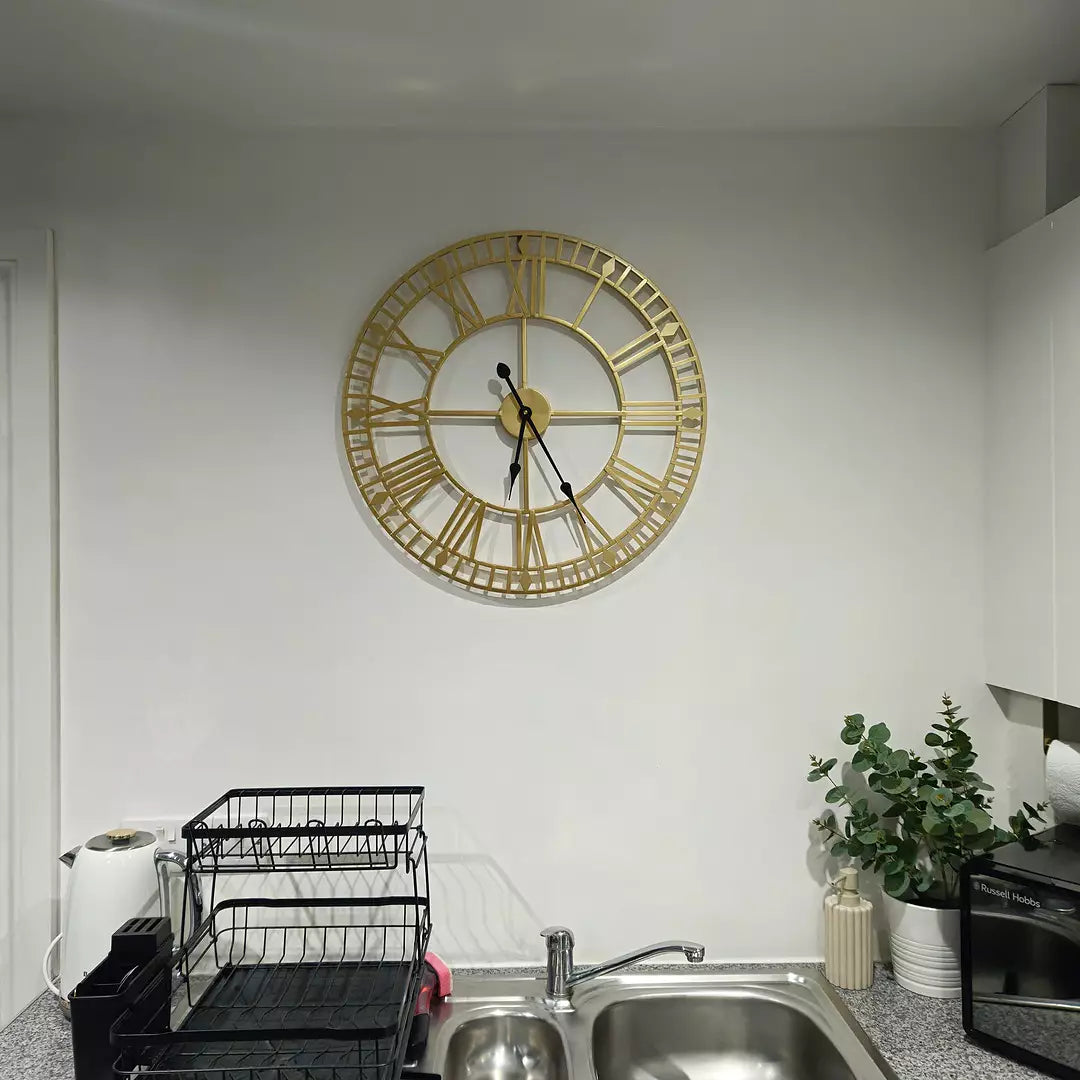 Riseley 60cm Metal Skeleton Wall Clock - Gold - Laura James
