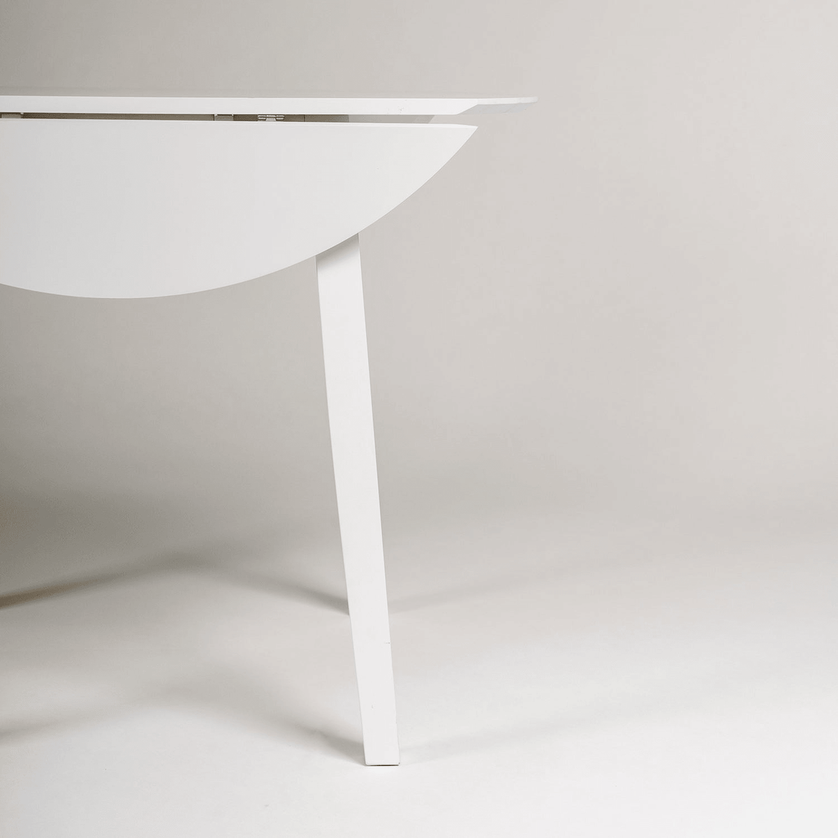 Charlie White Round dining table - with drop leaf