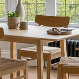 Charlie Pale Oak Extendable Dining Table Set - 4 Seater - Woven Pale Oak Dining Chairs - Laura James