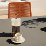 Amelia 6 Seater Dove Grey Concrete Garden Dining Set with Ryder Burnt Orange Chairs - Laura James