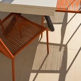 Amelia 6 Seater Pale Grey Concrete Garden Dining Set with Ryder Burnt Orange Chairs - Laura James