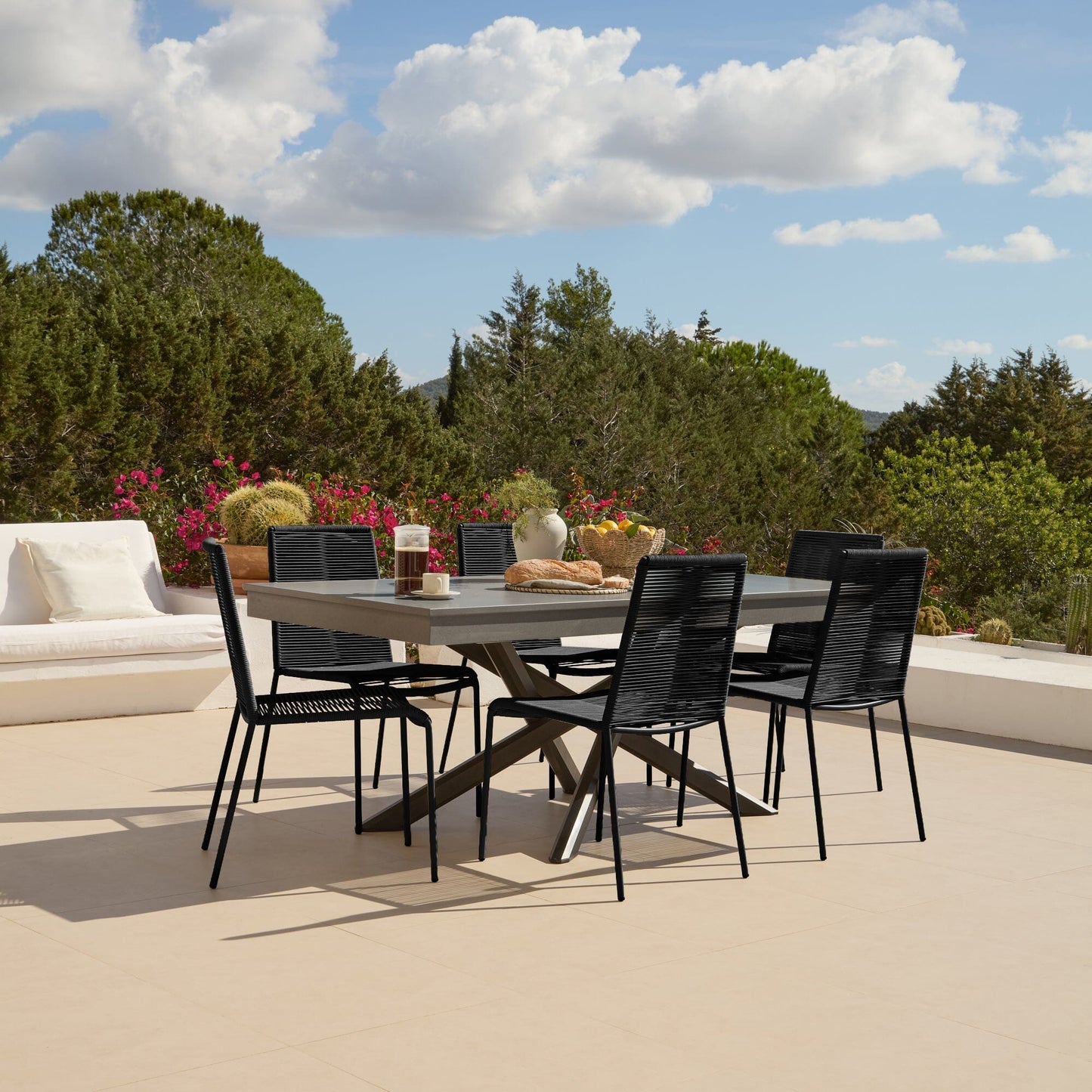 Amelia 6 Seater Dove Grey Concrete Garden Dining Set with Ryder Black Chairs - Laura James