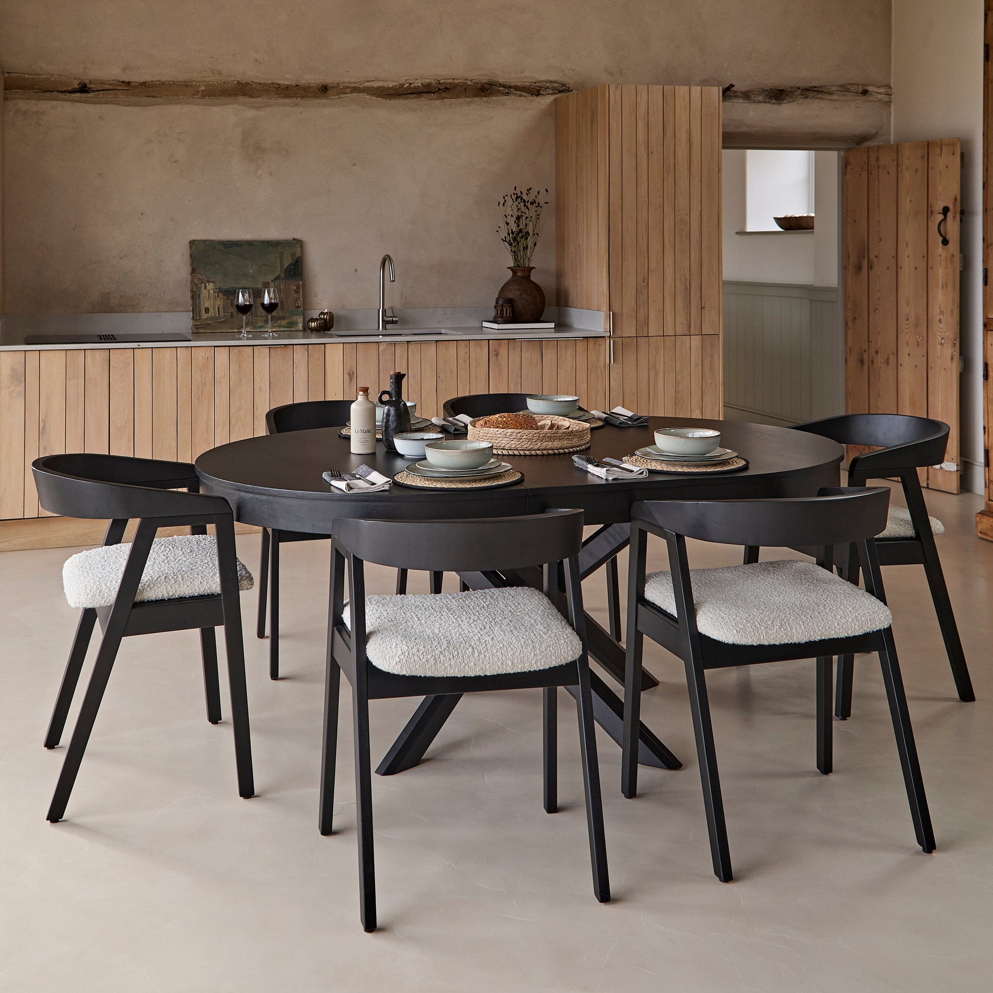 Amelia_Oval_140-180cm_Extending_Dining_Table_Black_Oak_and_Ella_Carver_Dining_Chair_Off_White_Boucle-12 - Laura James