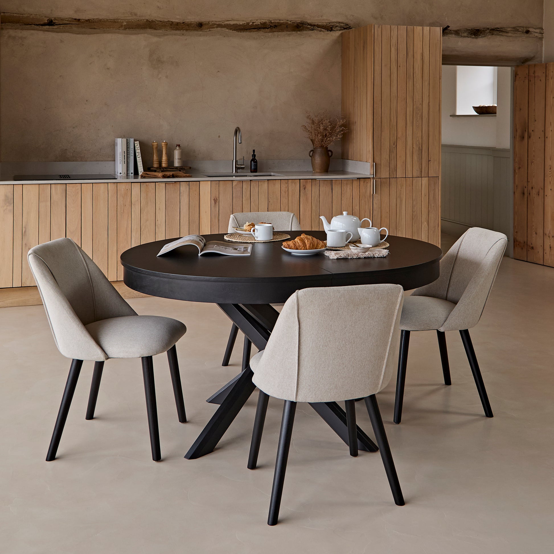 Amelia Black Oak Oval Extending Dining Table Set - 4 Seater - Freya Sand Dining Chairs - Black Oak Legs - Laura James