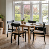Faye black woven dining chairs