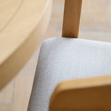Charlotte Pale Oak Round Dining Table Set - 4 Seater - Ella Pale Oak Carver Chair - Fawn Linen - Laura James