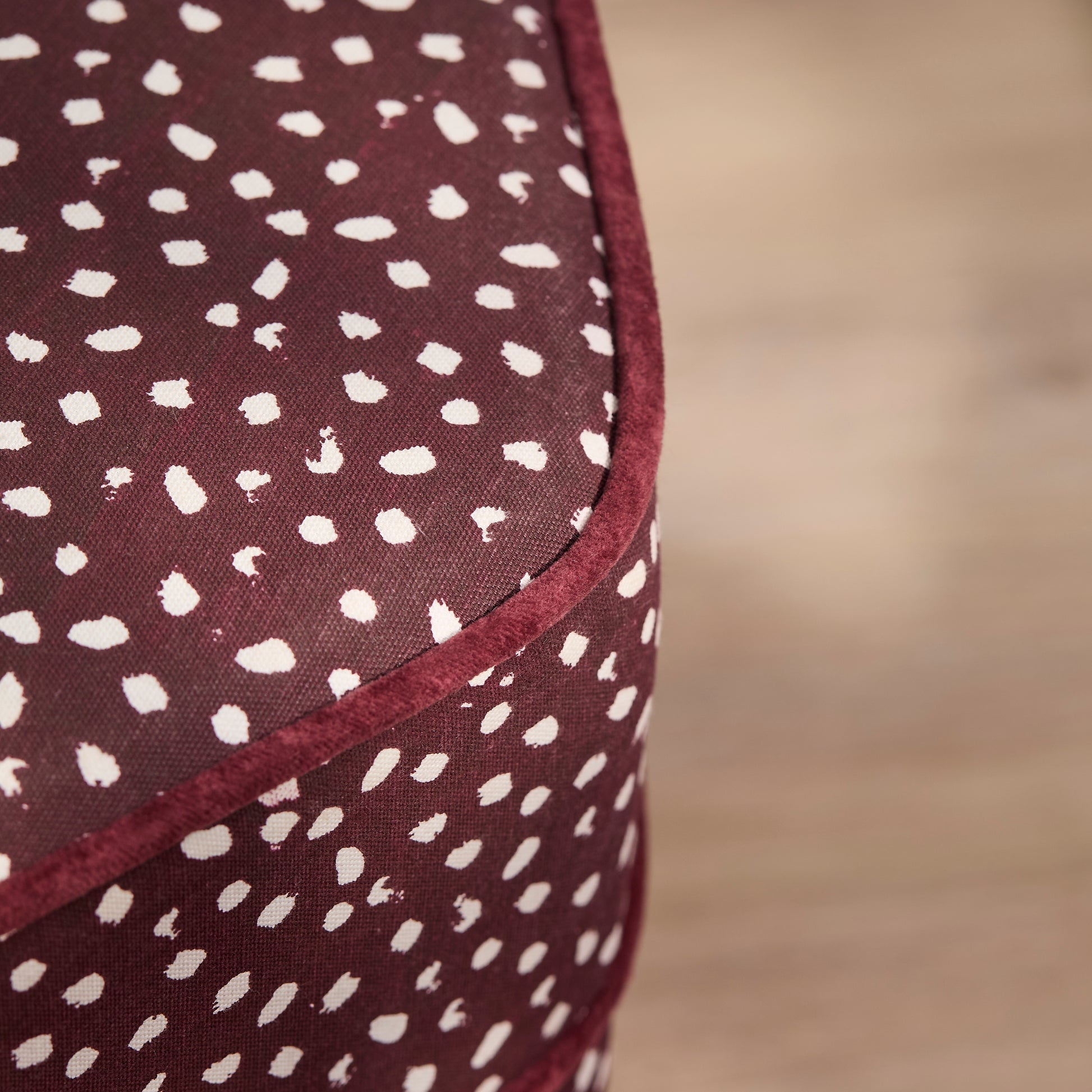 Margot 45cm Hexagon Footstool - Burgundy Spot with Burgundy Velvet Piping - Laura James 
