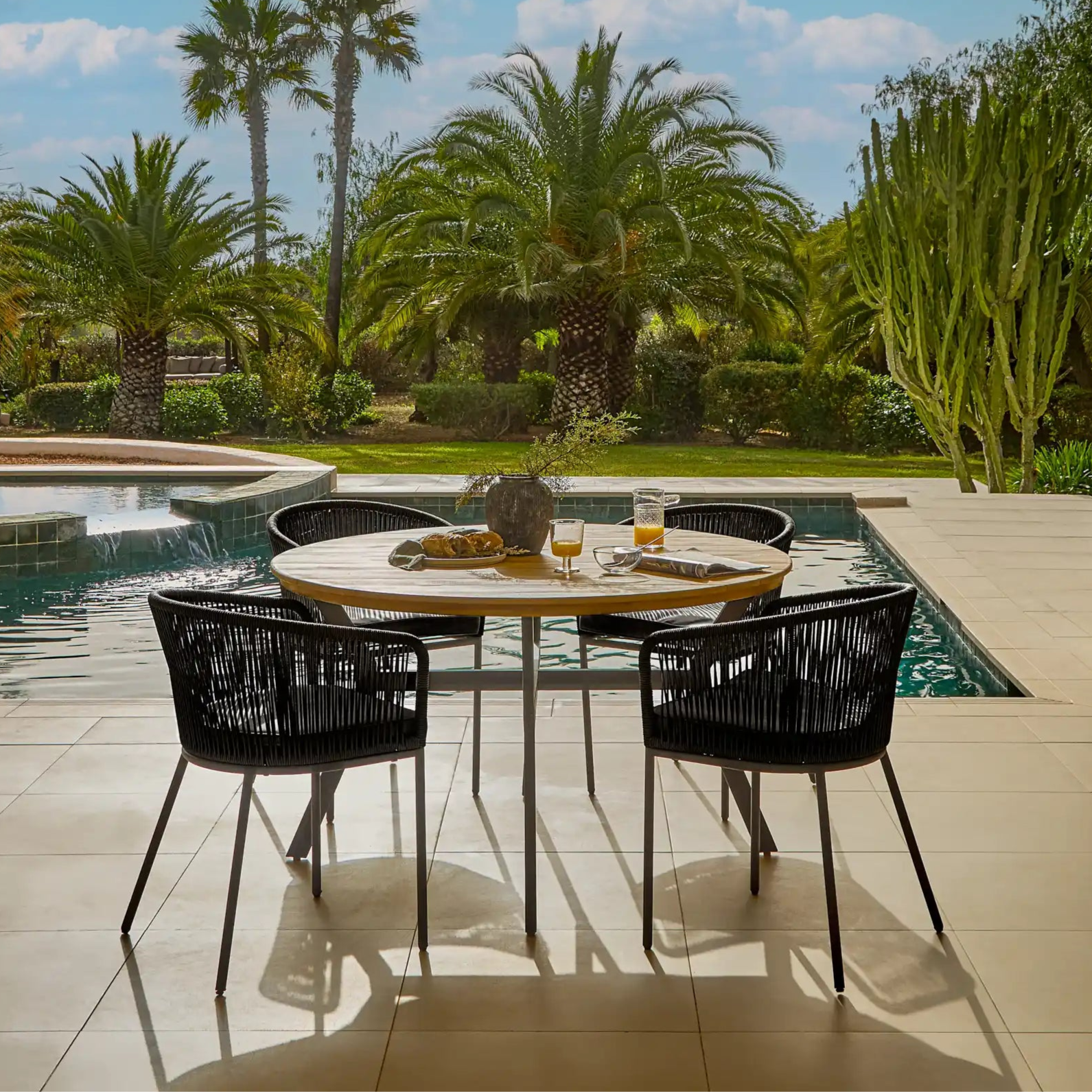 Ezra Seater Round Wooden Garden Dining Set with Hali Black