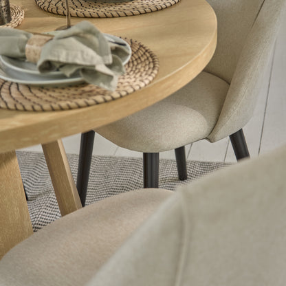 Farren 120cm Whitewash Oak Round Dining Table Set - 4 Seater - Freya Sand Dining Chairs with Black Legs - Laura James
