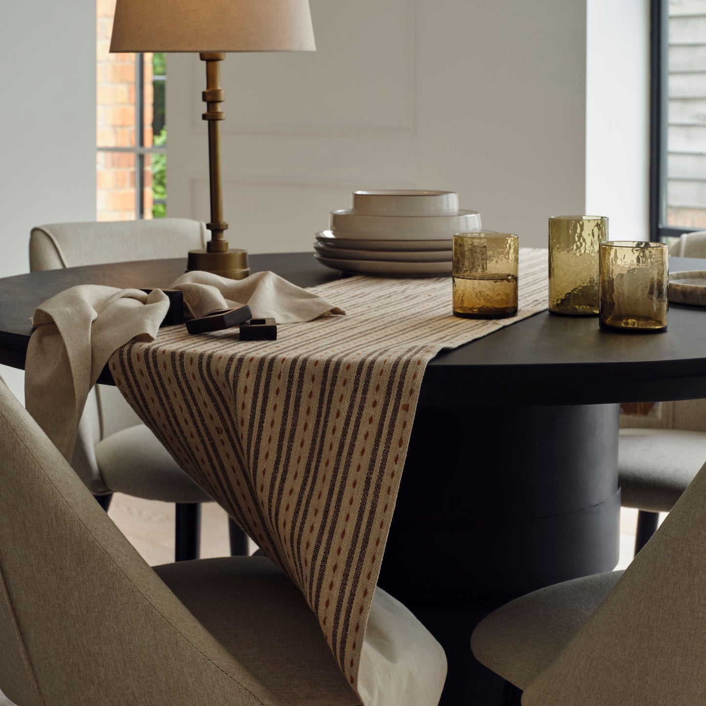 Adam 135cm Jet Black Mango Wood Round Dining Table Set - 4 Seater - Freya Sand Dining Chair - Black Oak Legs - Laura James 