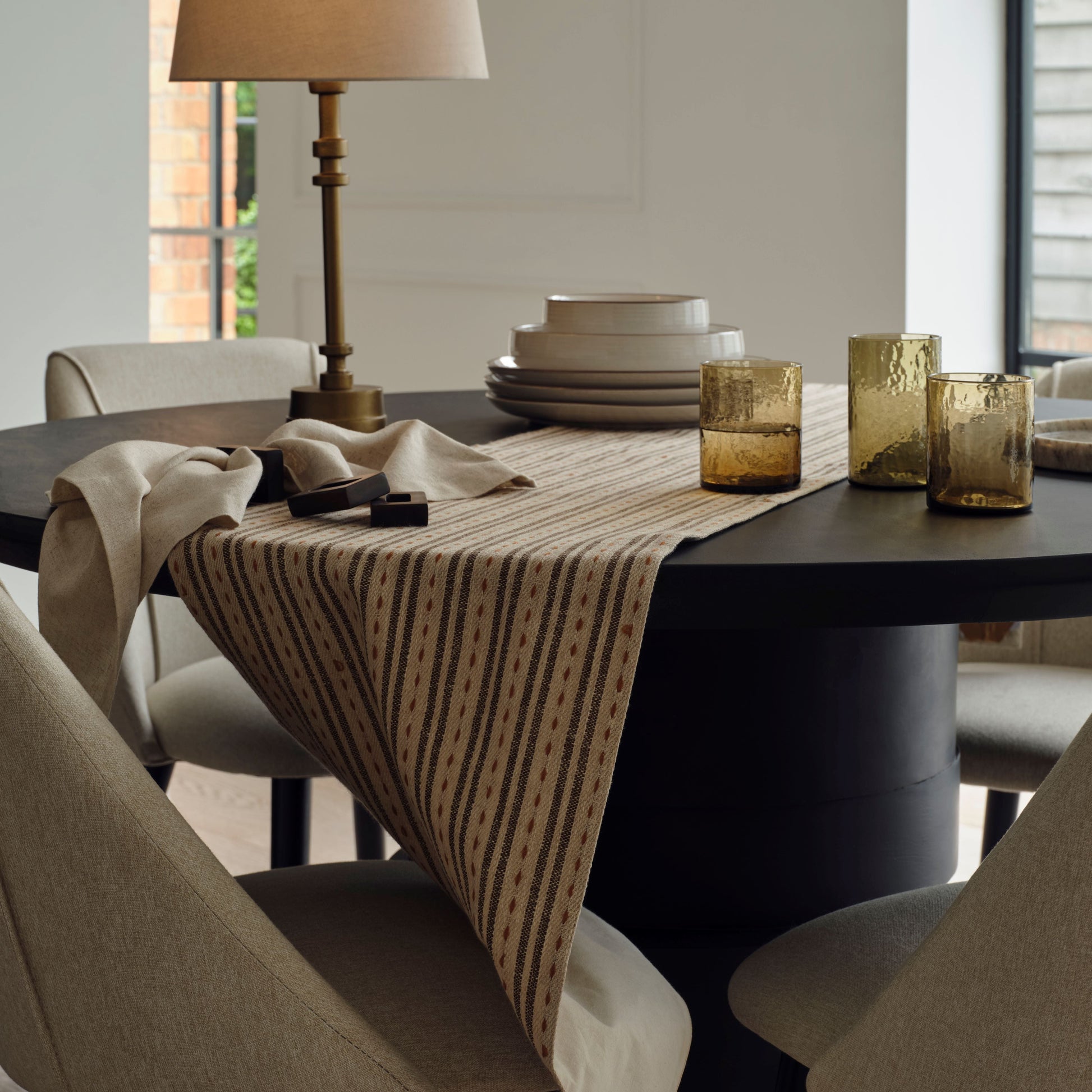 Adam 135cm Jet Black Mango Wood Round Dining Table Set - 4 Seater - Freya Sand Dining Chair - Black Oak Legs - Laura James 