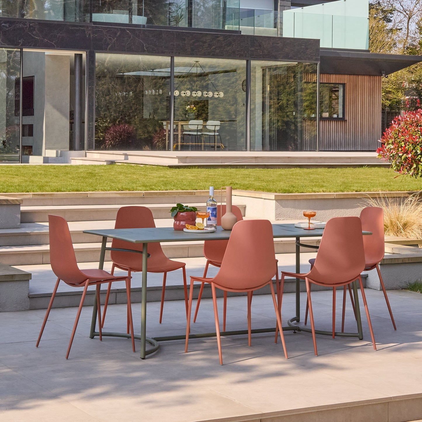 Wilder 6 Seater Metal Garden Dining Set with Wren Burnt Orange Chairs - Laura James 
