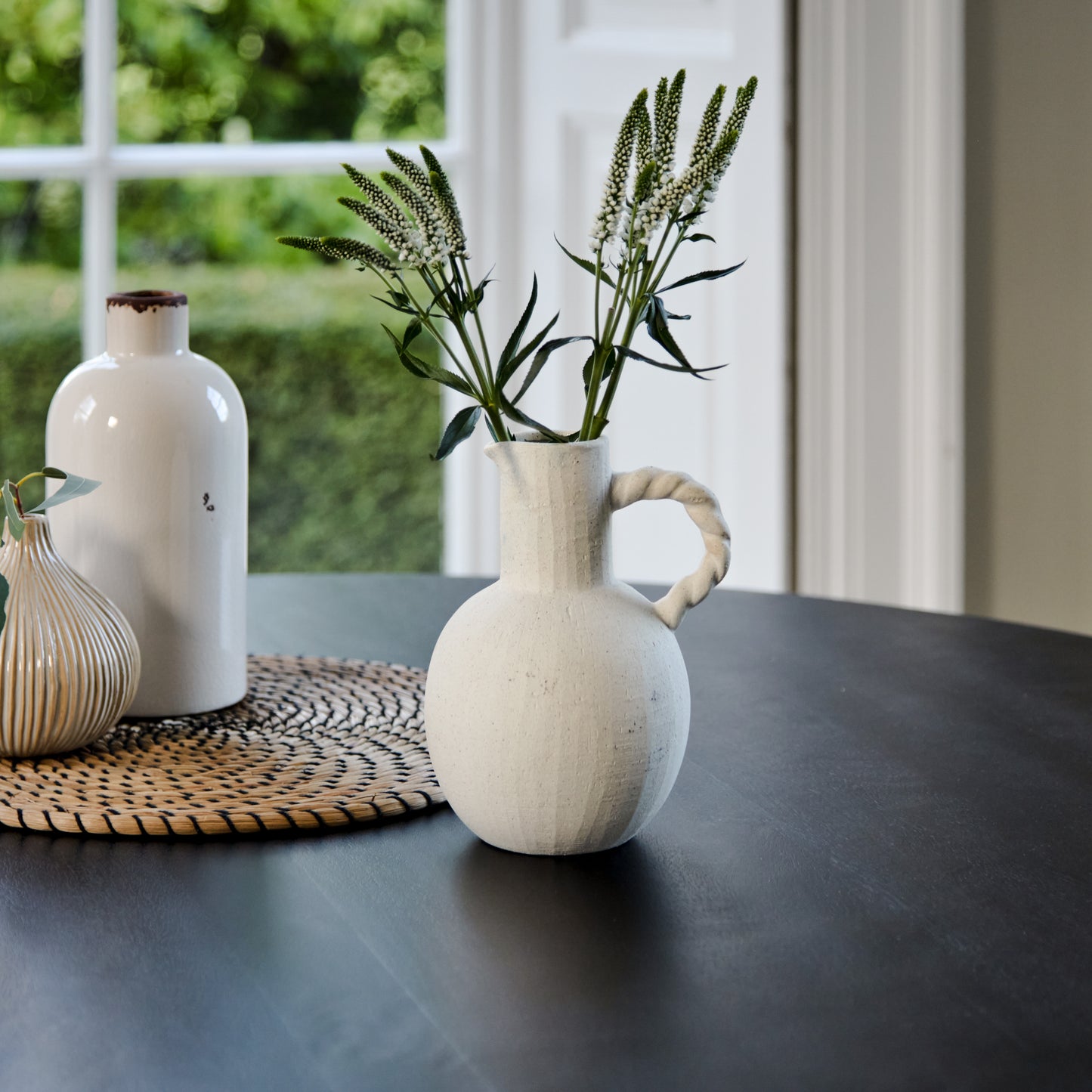 Orla Black Mango Wood Round Dining Table - Laura James