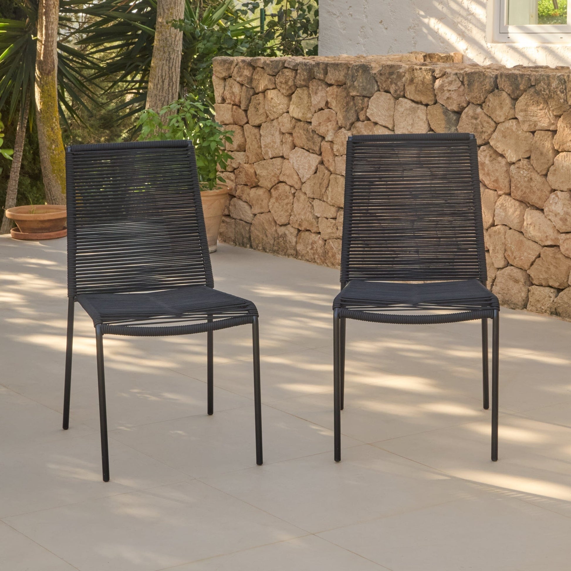 Ezra 6 Seater Oval Wooden Garden Dining Set with Ryder Black Chairs -Laura James