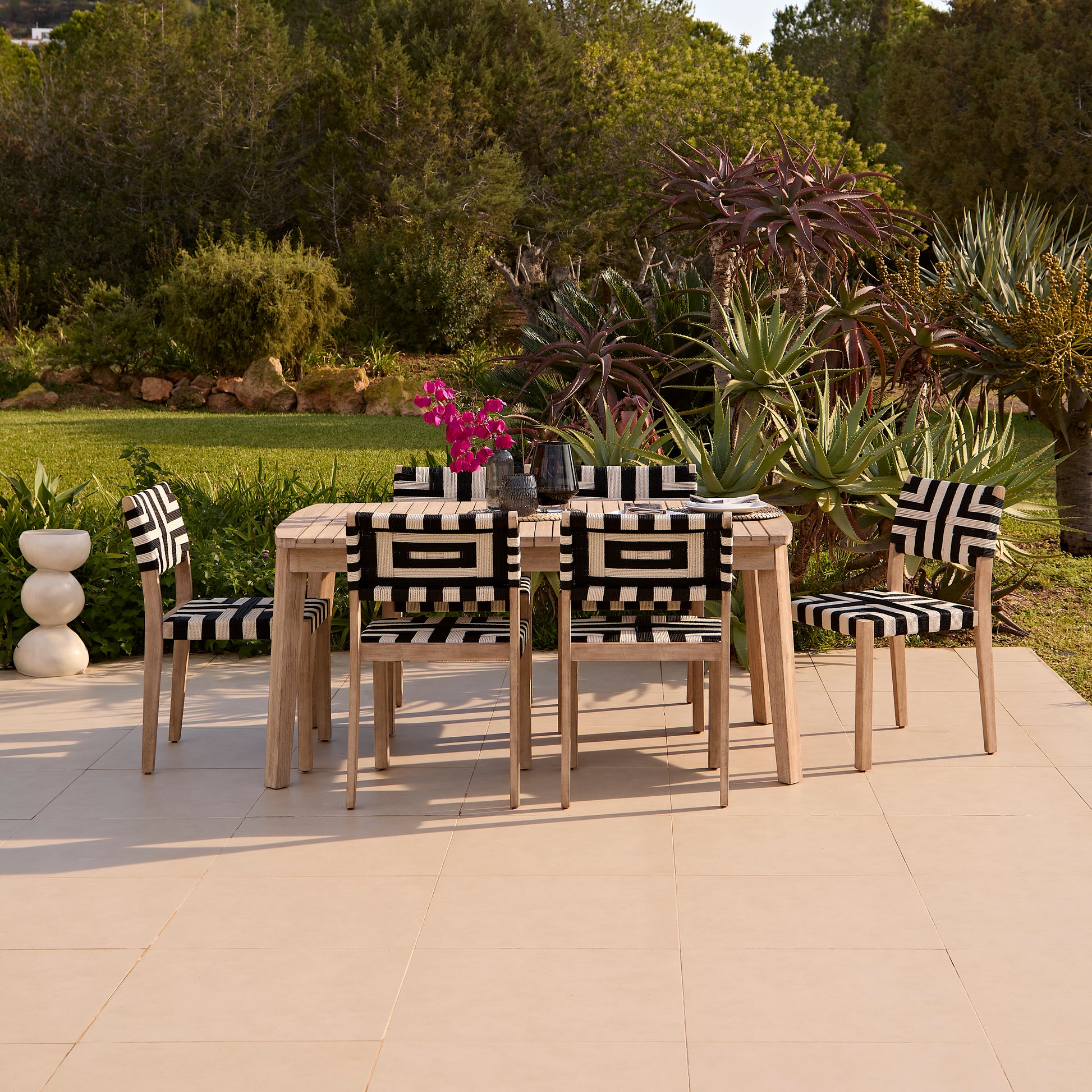 Saffron 6 Seater Extending Wooden Garden Dining Set with Saffron Black/Beige Chairs - Laura James