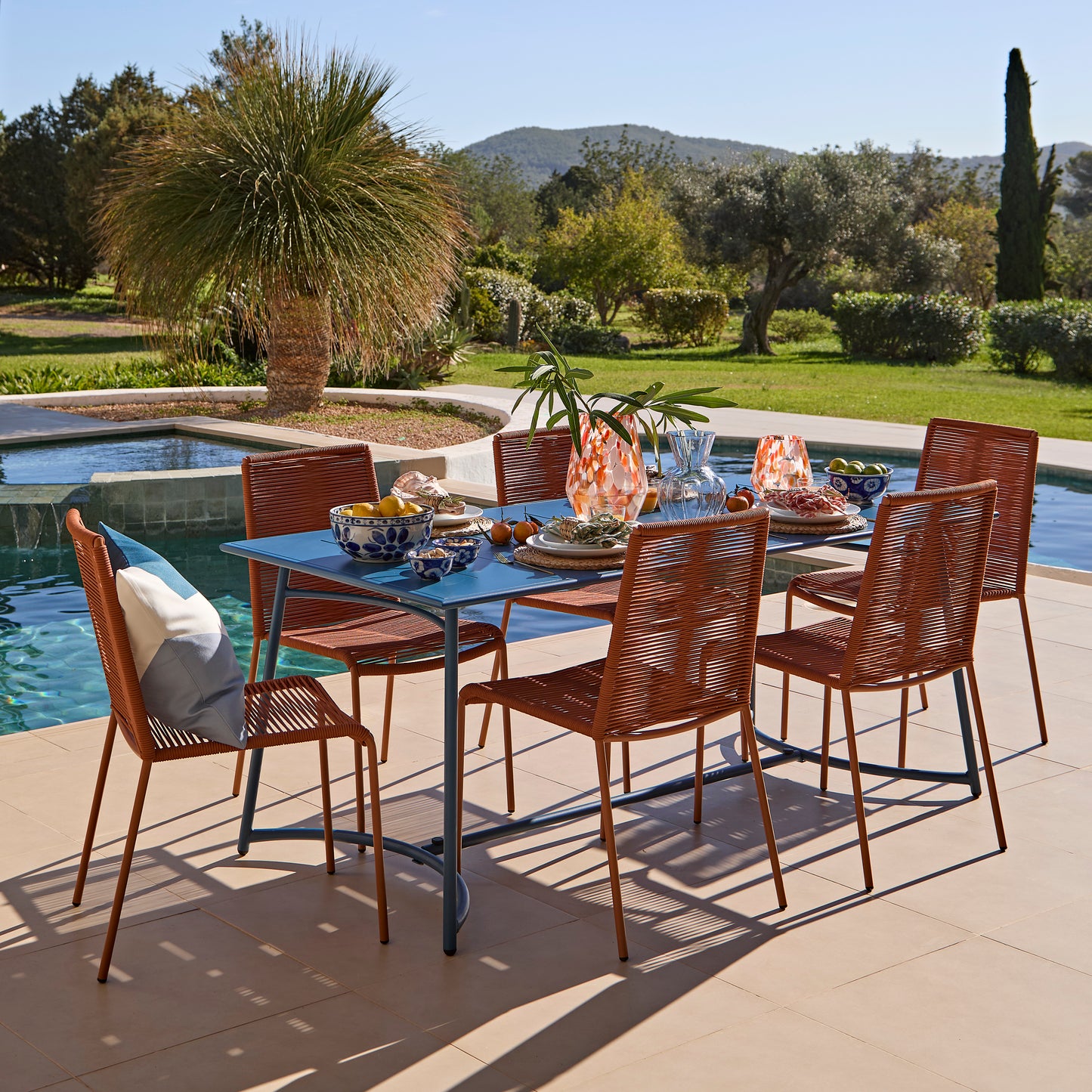 Wilder 6 Seater Blue Garden Dining Set with Ryder Burnt Orange Chairs - Laura James