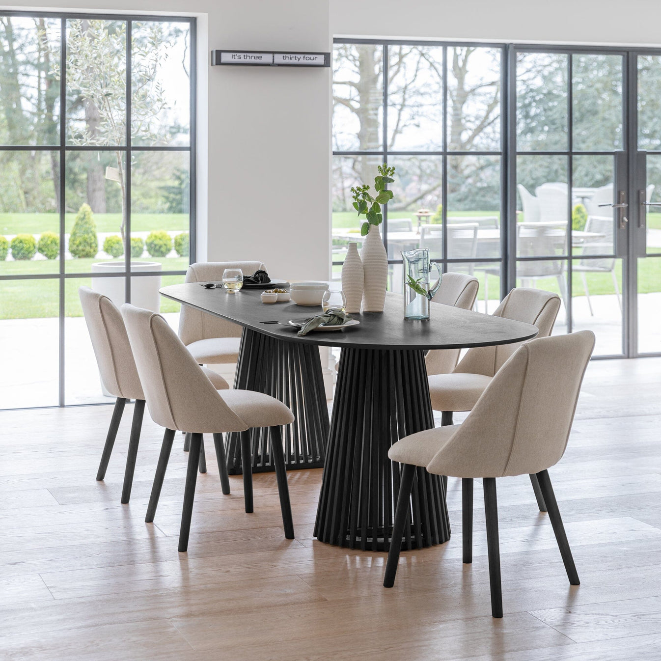 Willow Black Wood Oval Dining Table - Laura James