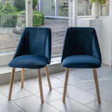 Amelia Whitewash Extendable Dining Table Set - 6 Seater - Freya Blue Dining Chairs With Pale Oak Legs - Laura James